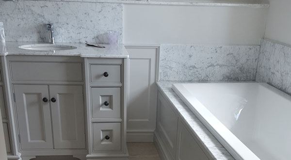 Bianco Carrara Marble (cabinetry by Rose County Interiors)